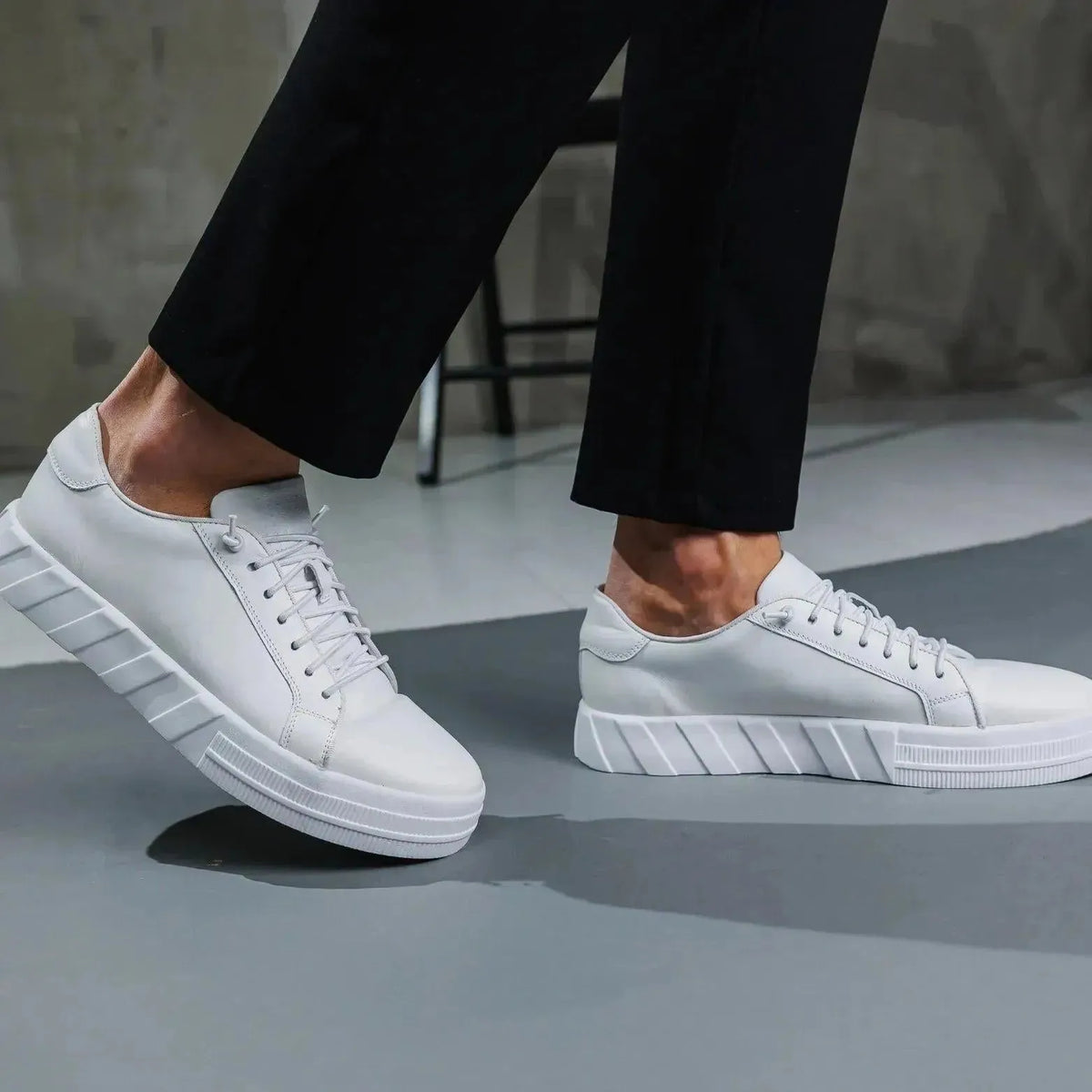 White low-top leather sneakers — refined street style from LabelTerrace curated men’s collection.