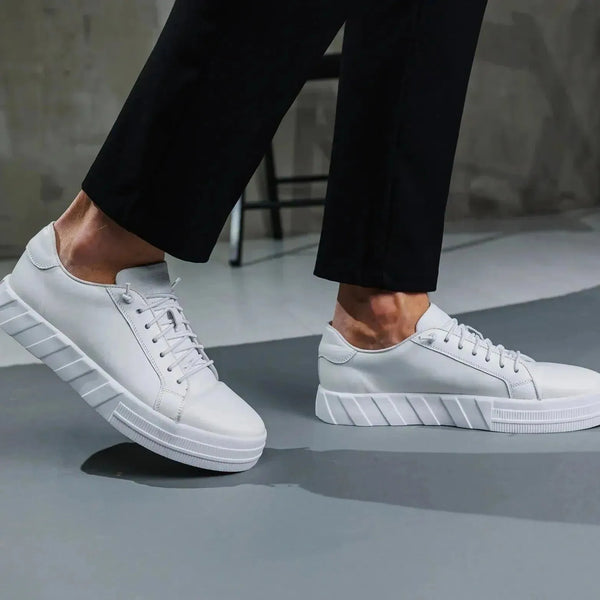 White low-top leather sneakers — refined street style from LabelTerrace curated men’s collection.