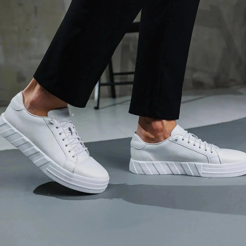White low-top leather sneakers — refined street style from LabelTerrace curated men’s collection.