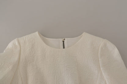 فستان أبيض متوسط الطول من قماش الجاكار مع نقشة الزهور