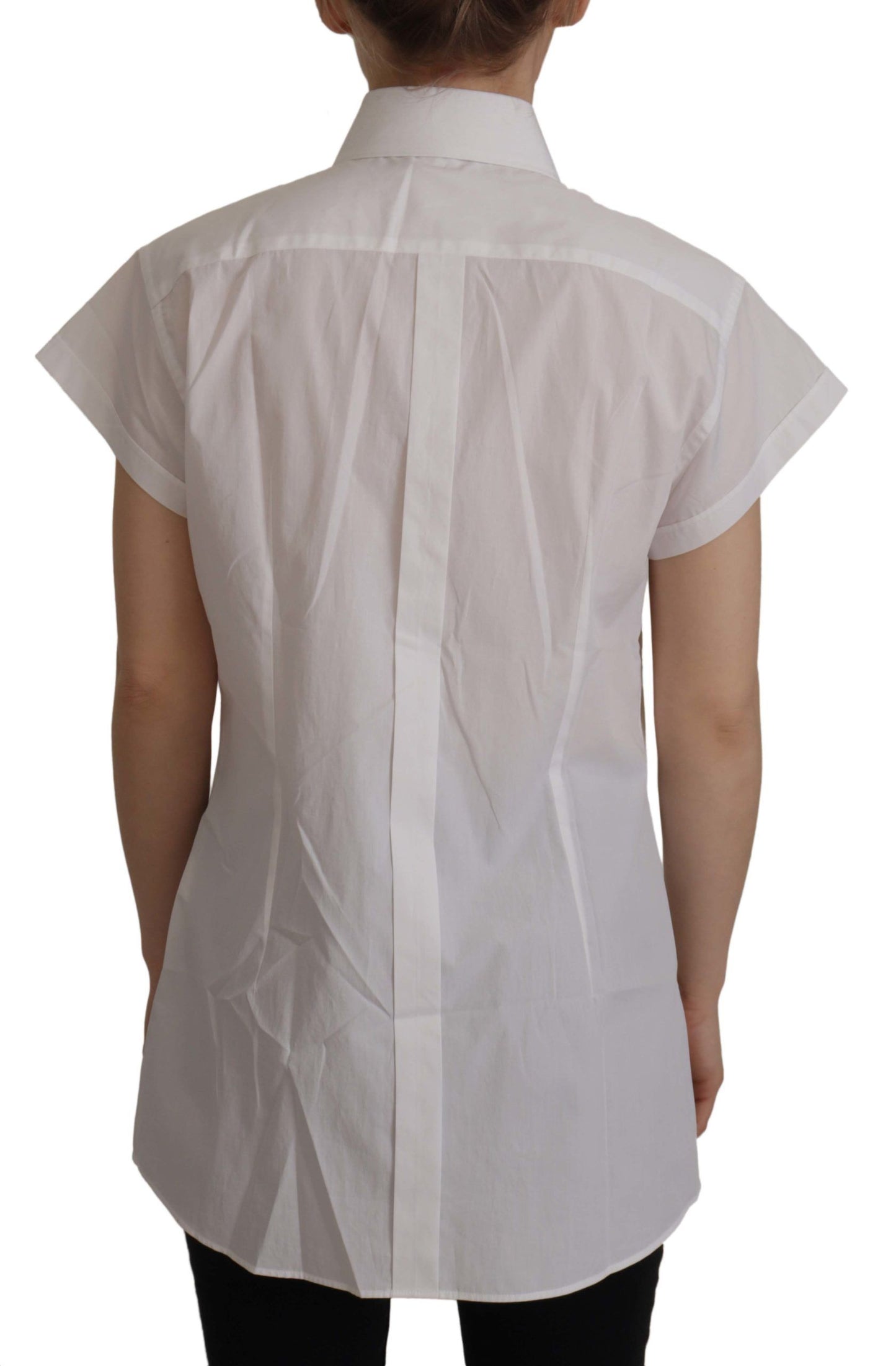 بلوزة رسمية بدون أكمام باللون الأبيض