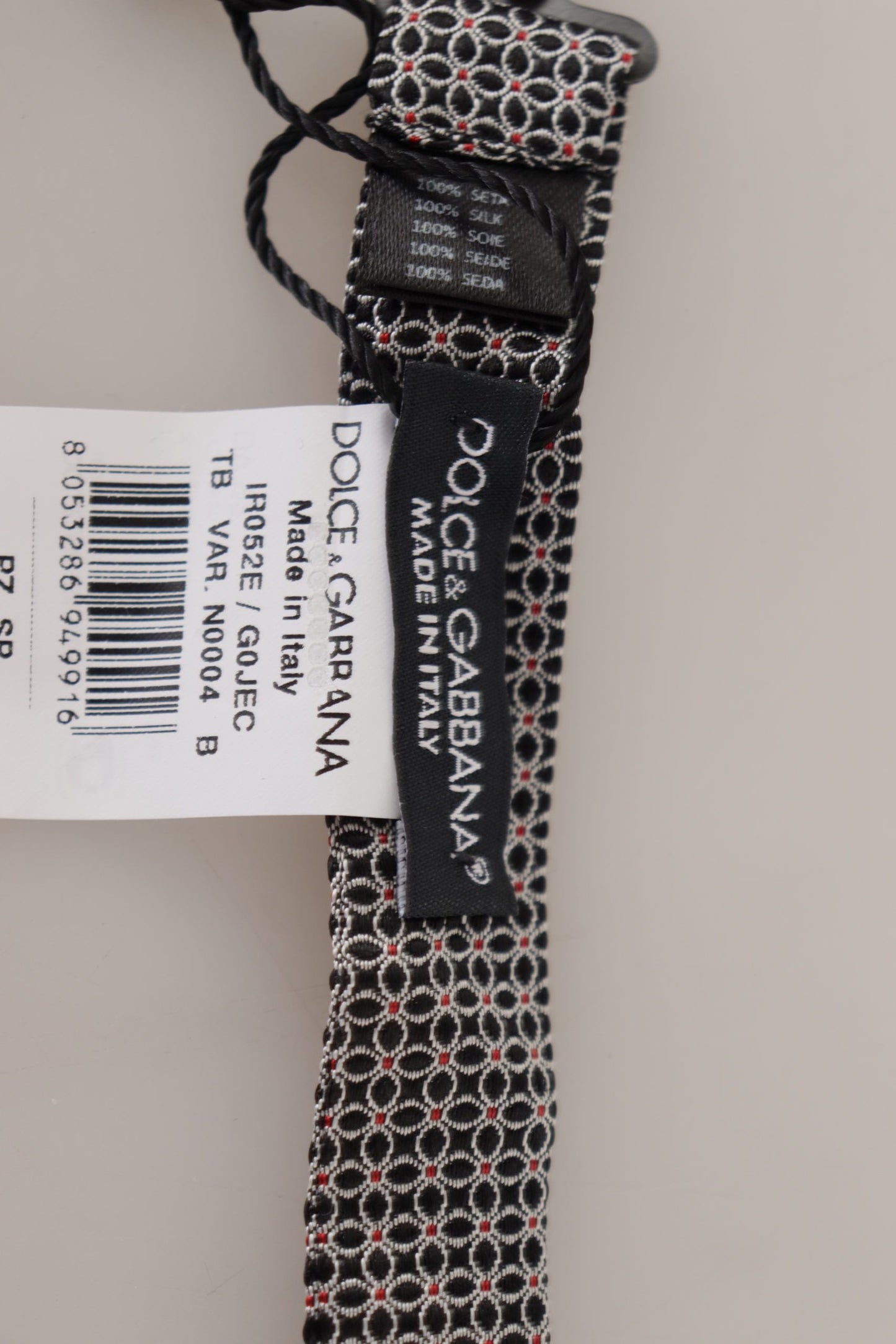 ربطة عنق بابيلون من الحرير بنقشة زهور باللونين الأبيض والأسود