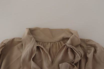 بلوزة بنية اللون بأكمام على الخصر وياقة أسكوت