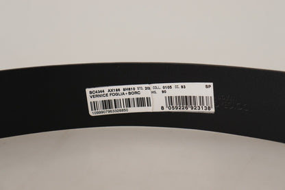 حزام من الجلد الأزرق اللامع مع مشبك شعار فضي