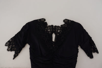 فستان أسود ضيق متوسط الطول من الدانتيل والحرير