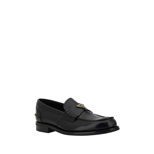 Trekantede loafers med plakette