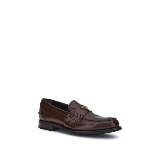 Trekantede loafers med plakette